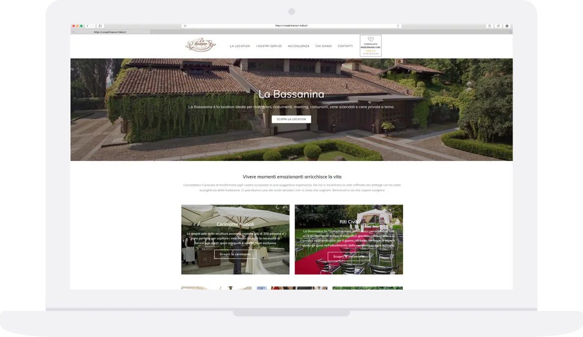 Laptop showing the La Bassanina home page and the venue’s courtyard